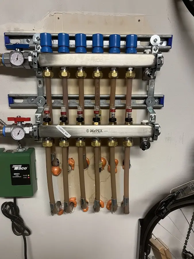 Plumber performing Gas Line Installation at a residential property in Huber Ridge